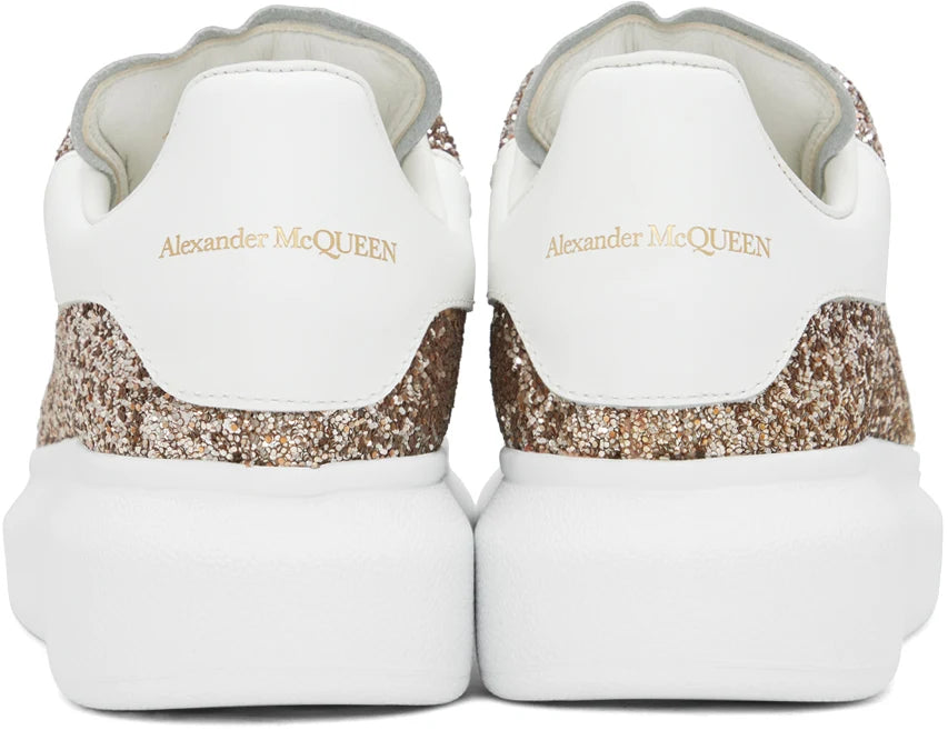 ALEXANDER MCQUEEN Sneakers oversize con glitter in oro rosa TIME OUTLET ABBIGLIAMENTO